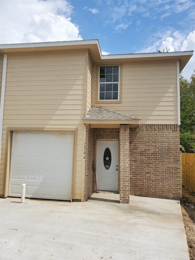 view of front of home featuring a garage