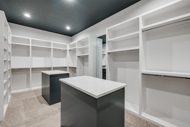 2231 Colquitt St, Houston, TX 77098 - walk in closet featuring light colored carpet