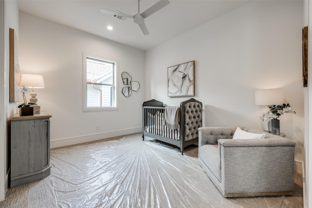 2231 Colquitt St, Houston, TX 77098 - bedroom featuring baseboards, a crib, carpet, ceiling fan, and recessed lighting