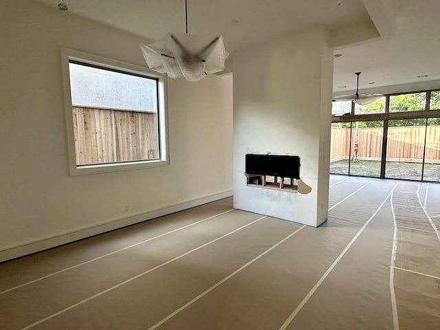 2231 Colquitt St, Houston, TX 77098 - unfurnished living room featuring a ceiling fan
