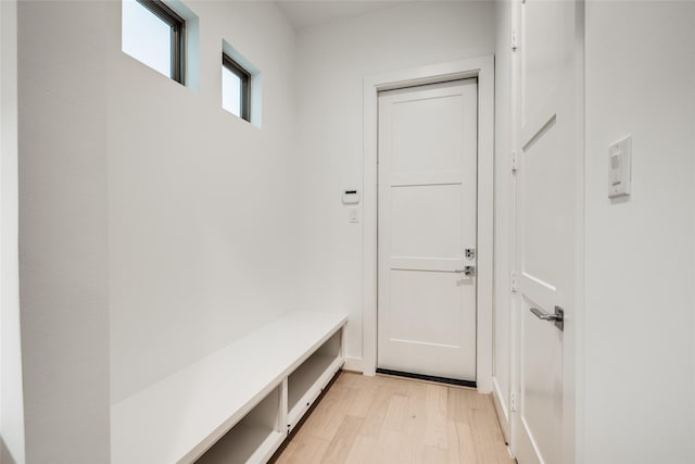 mudroom with light hardwood / wood-style flooring