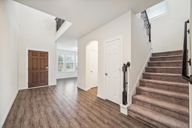 entrance foyer featuring dark hardwood / wood-style floors