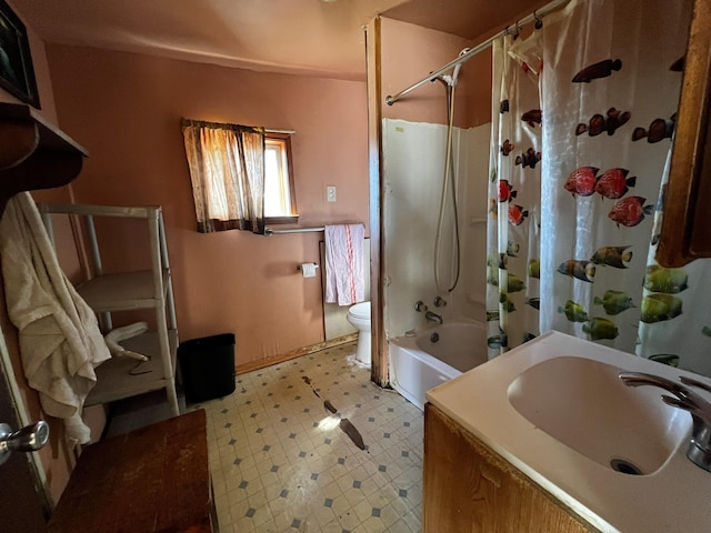 full bathroom with toilet, shower / tub combo, and vanity