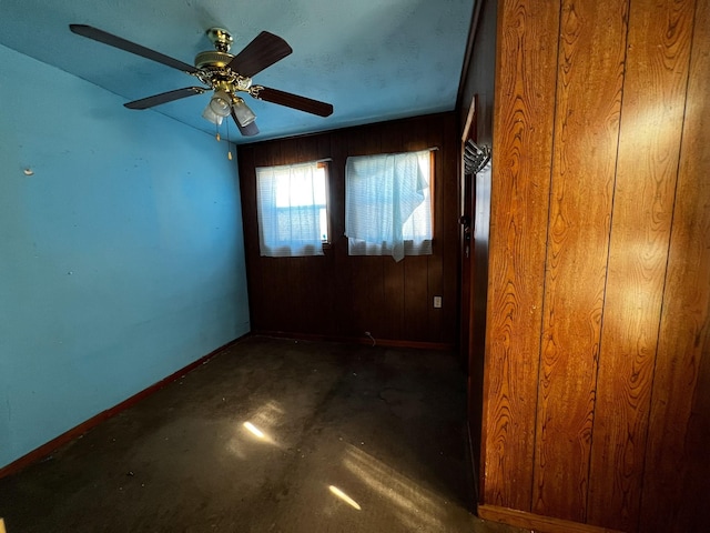 spare room featuring ceiling fan