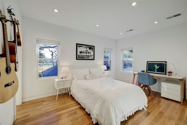 bedroom featuring light hardwood / wood-style flooring