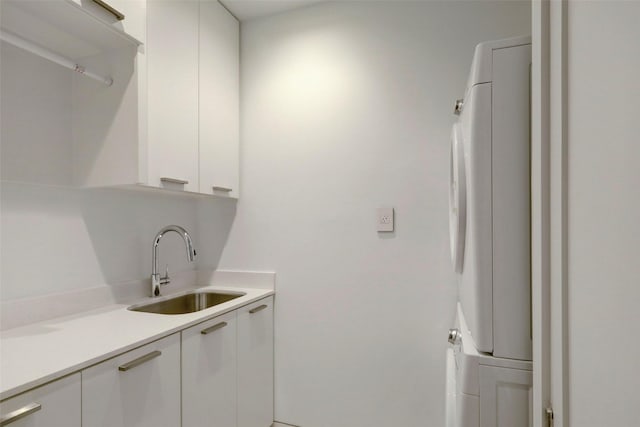 laundry area featuring washer / clothes dryer and sink