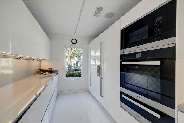 interior space with light tile patterned flooring