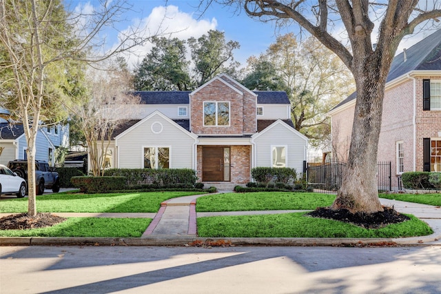 view of property with a front lawn