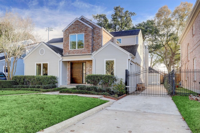 front of property with a garage and a front lawn