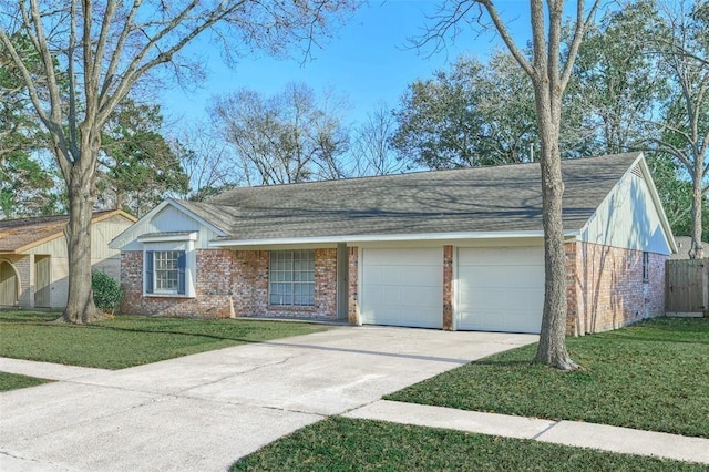 ranch-style house with a garage and a front yard