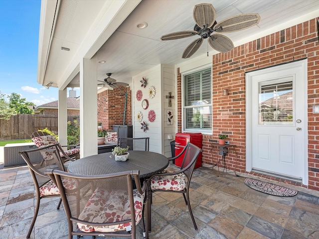 view of patio / terrace featuring ceiling fan