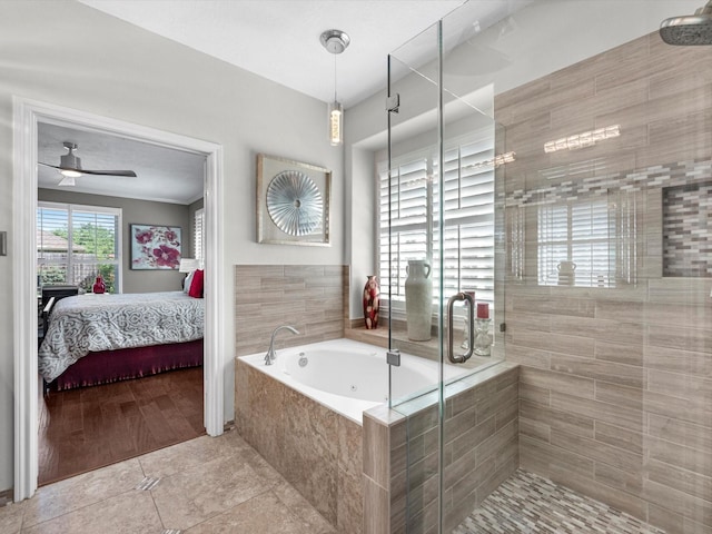 bathroom with ceiling fan, separate shower and tub, and tile patterned flooring