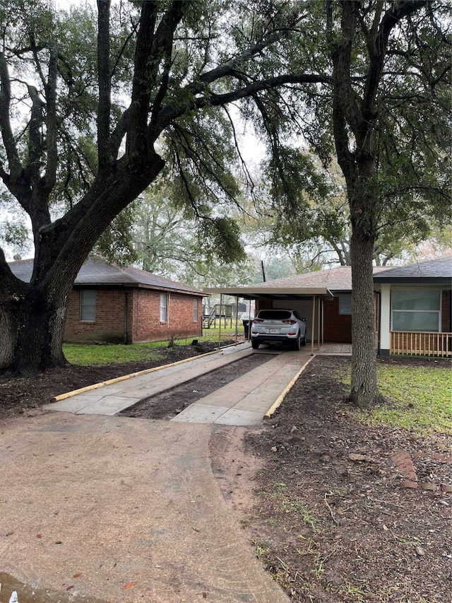 view of front of property with a carport