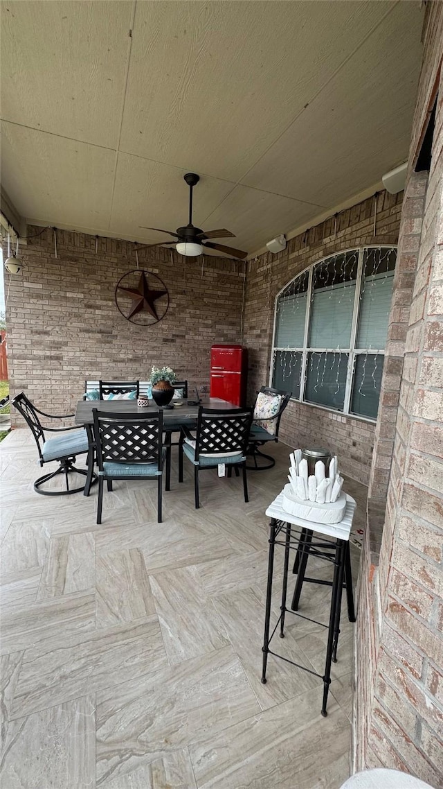 view of patio / terrace with ceiling fan