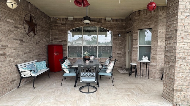 view of patio with ceiling fan