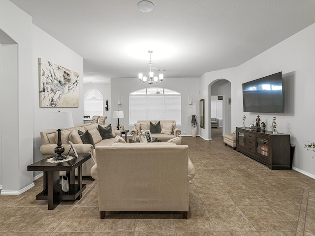 living room featuring a chandelier