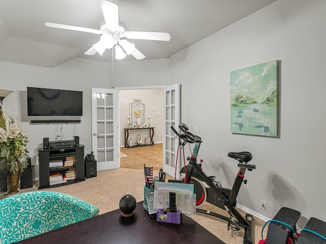 exercise area with carpet floors, ceiling fan, and french doors