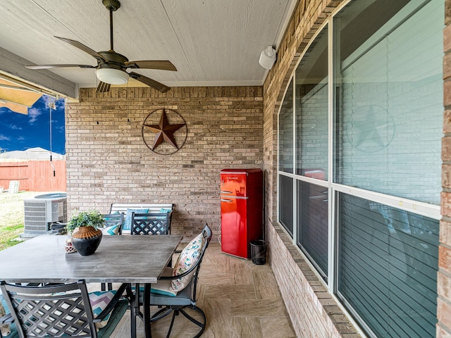 view of patio / terrace featuring ceiling fan and central air condition unit