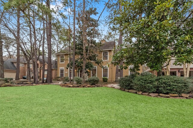 view of front of house featuring a front yard