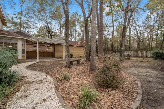 view of yard with a pergola