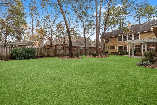 view of yard with a pergola