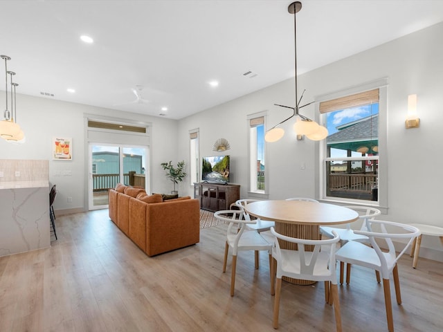 dining room with light hardwood / wood-style floors