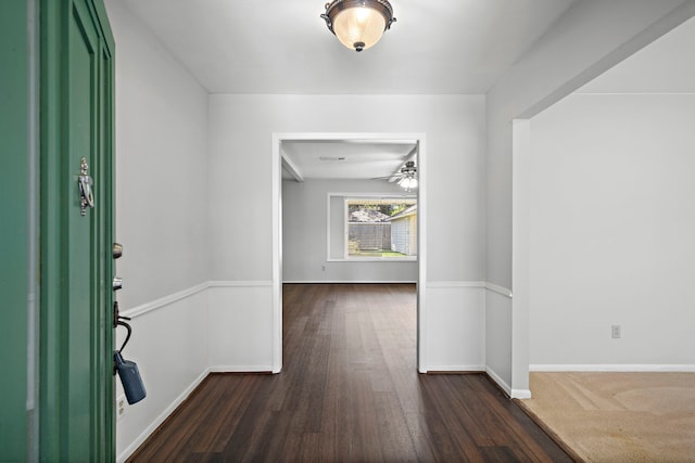 entryway with dark hardwood / wood-style flooring