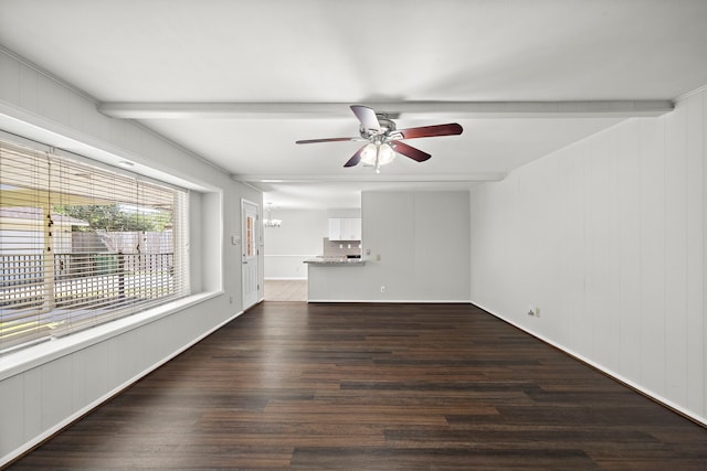 unfurnished living room featuring ceiling fan, beamed ceiling, and dark hardwood / wood-style floors