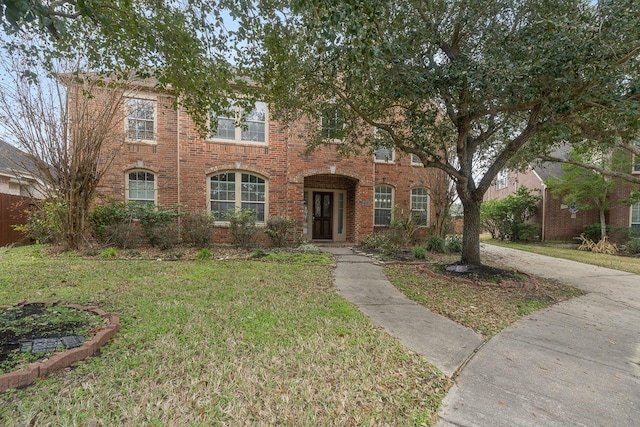 view of front facade featuring a front yard