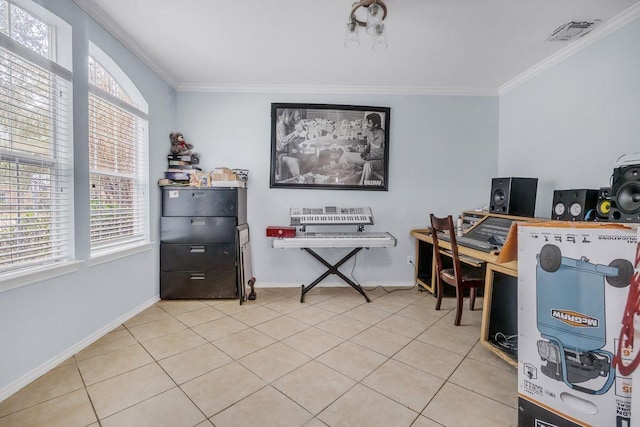 office space featuring a wealth of natural light, ornamental molding, and light tile patterned flooring