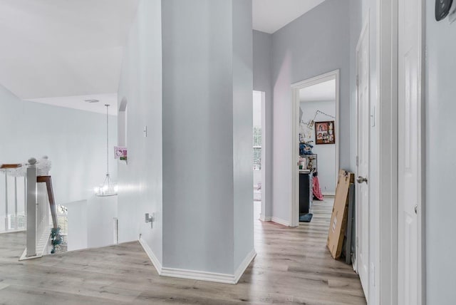 hallway with light wood-type flooring