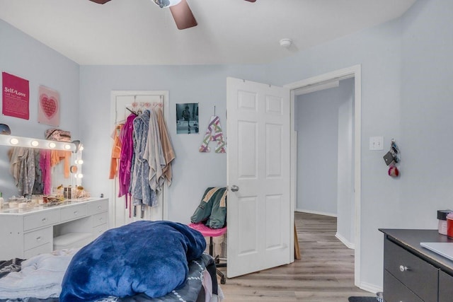 bedroom featuring ceiling fan and light wood-type flooring