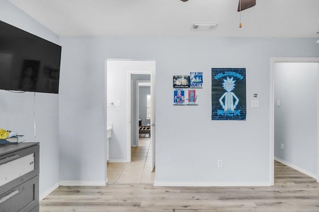 interior space featuring ceiling fan and light hardwood / wood-style flooring