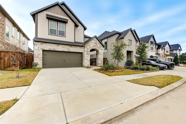 view of front of home with a garage and a front yard