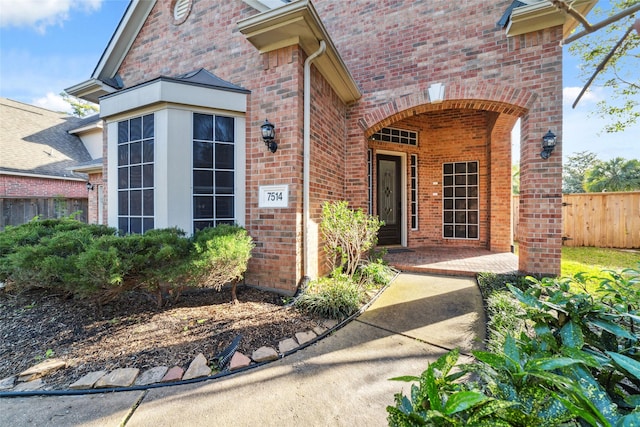 entrance to property with a patio area