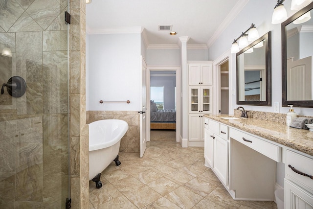 bathroom with crown molding, vanity, separate shower and tub, and tile walls