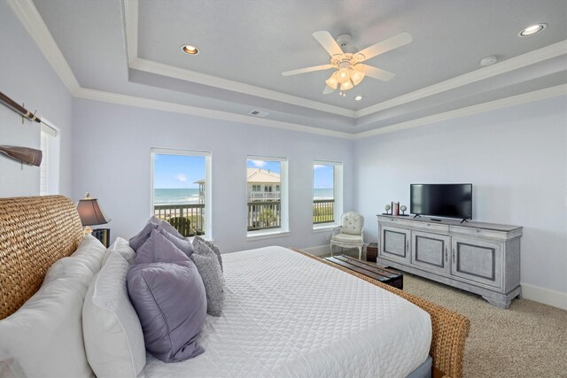 11622 Beachside, Galveston, TX 77554 - bedroom featuring a raised ceiling, crown molding, baseboards, recessed lighting, and carpet flooring