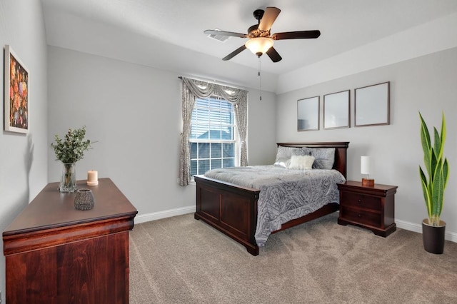 bedroom featuring light colored carpet and ceiling fan