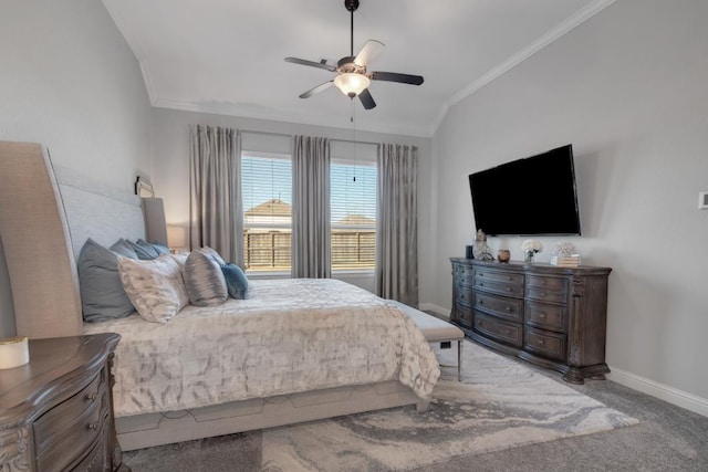 bedroom with lofted ceiling, crown molding, ceiling fan, and carpet