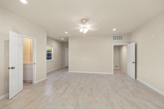 empty room featuring ceiling fan