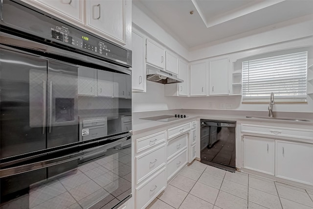 kitchen featuring white cabinetry, sink, light tile patterned floors, and black appliances