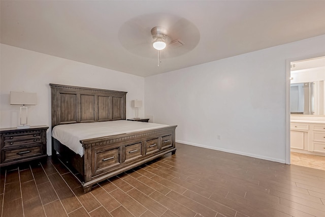 bedroom featuring ensuite bath and ceiling fan