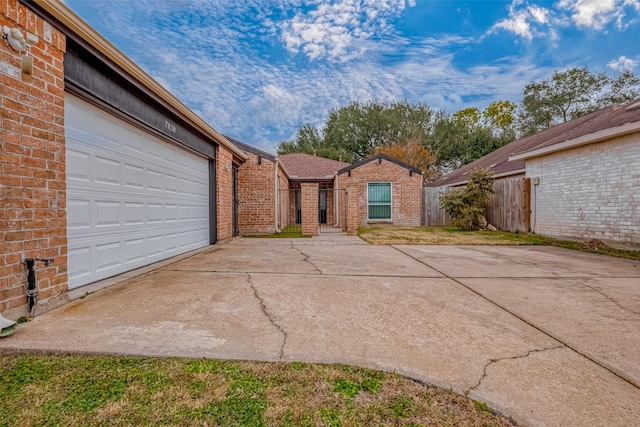 ranch-style house featuring a garage