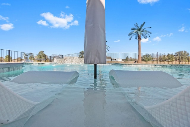 view of pool featuring pool water feature