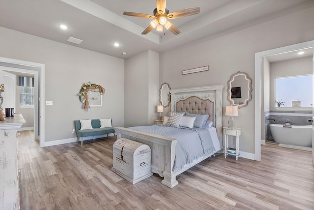 bedroom featuring light hardwood / wood-style flooring and ceiling fan