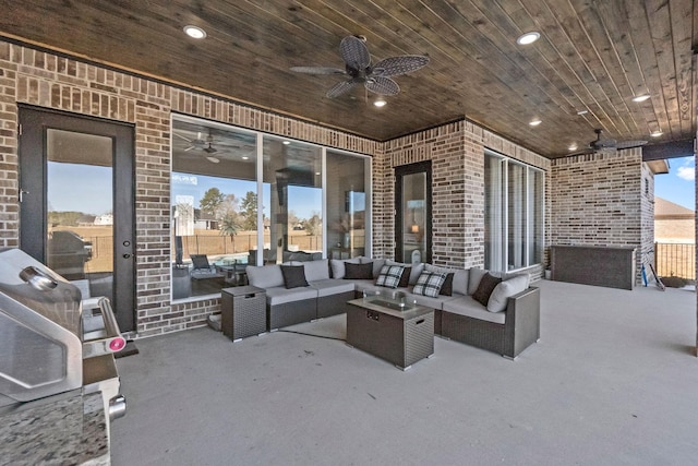 view of patio / terrace featuring ceiling fan, a grill, and an outdoor hangout area