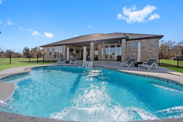 view of swimming pool featuring a patio area