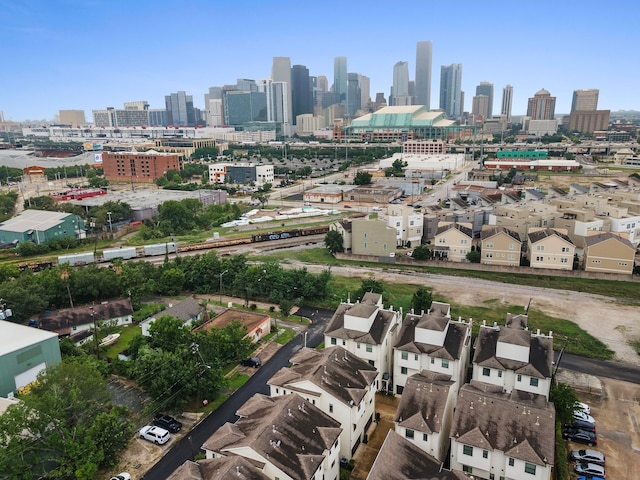 drone / aerial view featuring a city view