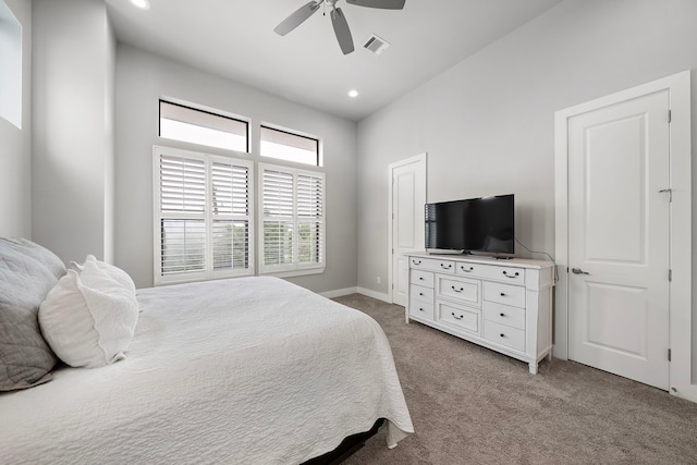 bedroom with visible vents, baseboards, light colored carpet, ceiling fan, and recessed lighting