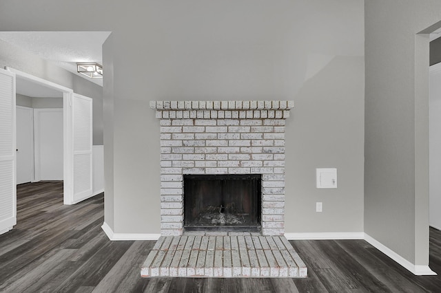 interior details with hardwood / wood-style flooring and a fireplace